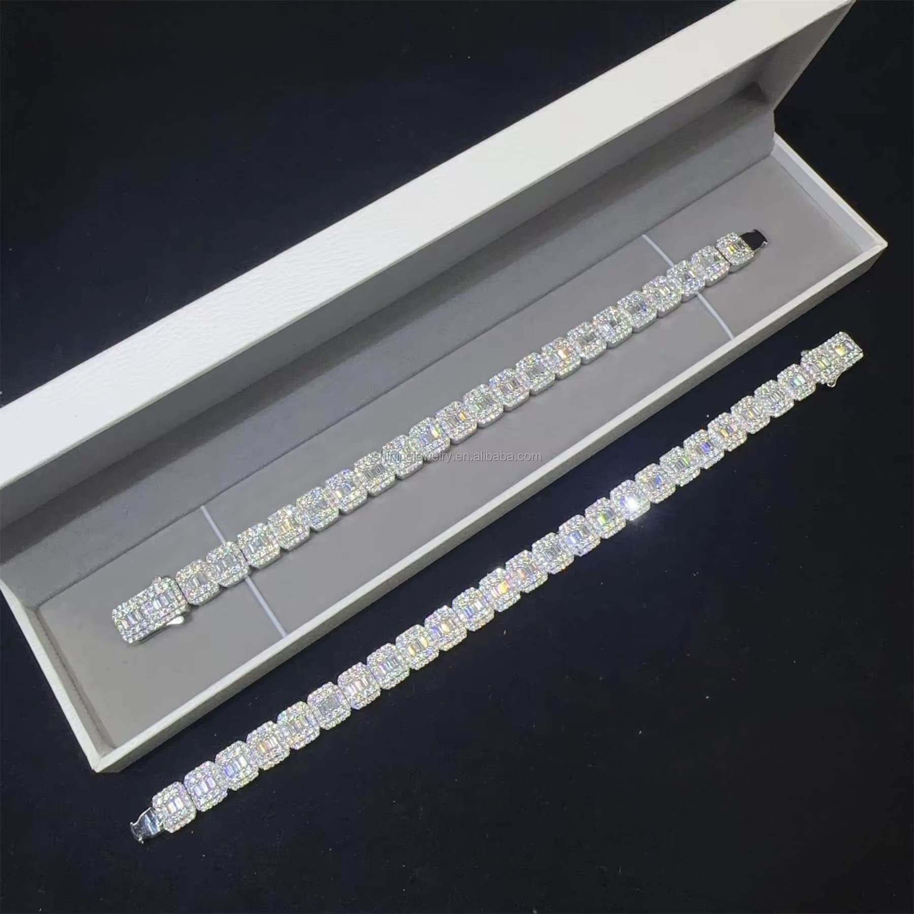 Diamond bracelet in a white box on a black background

